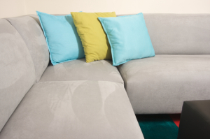 Abstract of Grey Suede Couch & Pillows